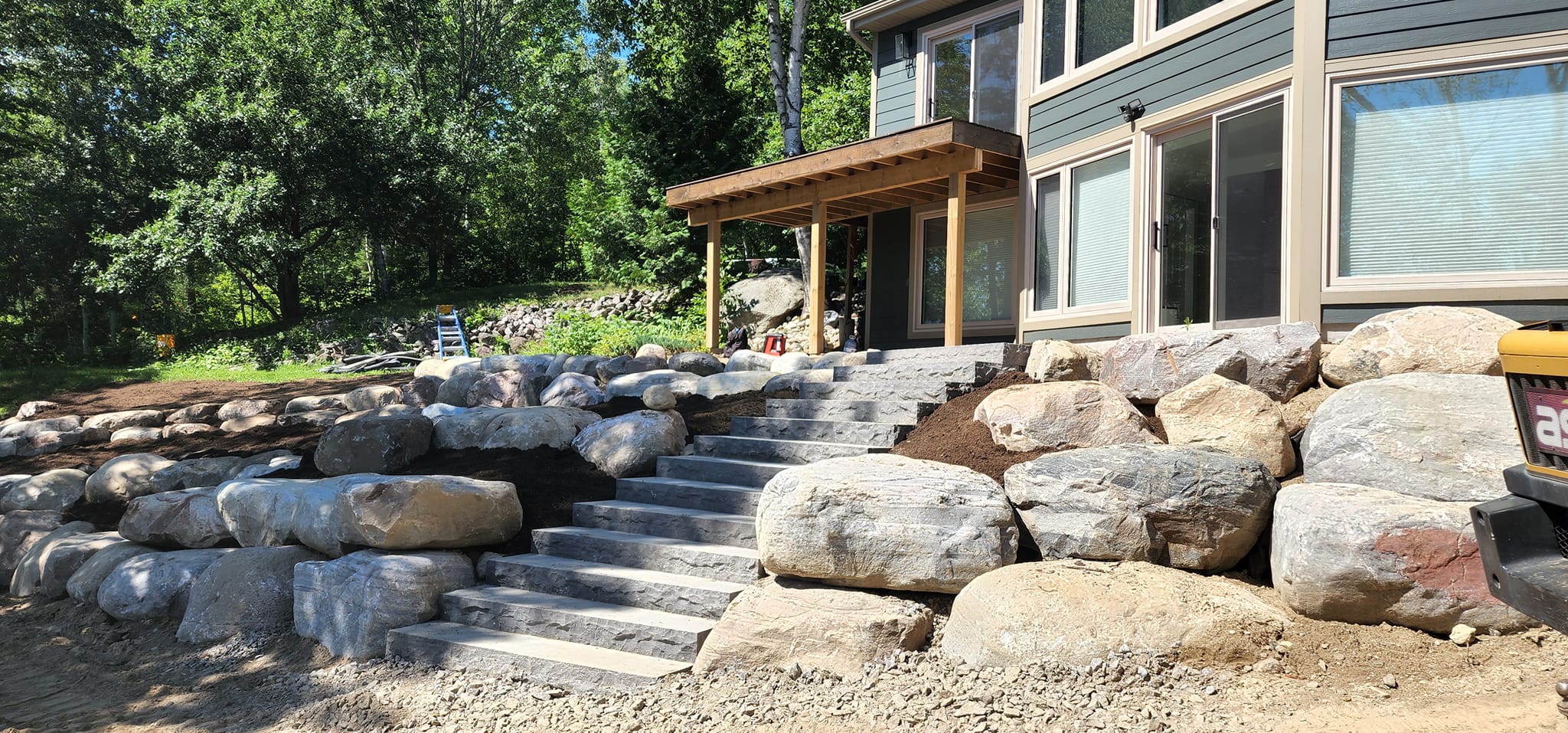 Boulder retaining wall